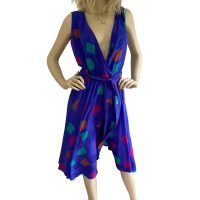lora Kung blue silk wrap Selma dress. Bias-cut skirt Elastic waist true wrap. Original print on Flora's original geo silk jacquard.